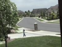 Boys Windsurfing on Sidewalk