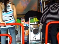 Sana and Paola on Dance Dance Revolution