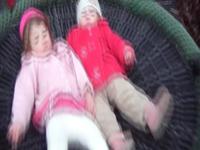 Scarlett and Ivy on the best swing in the world!