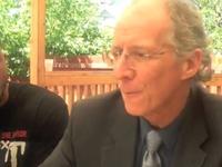 DWYL Tour members sit with John Piper
