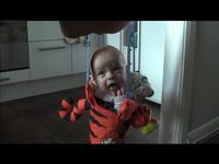 Christoper Laughing in his Bouncer