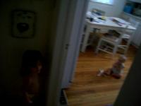Audrey plays peek-a-boo with Whitaker