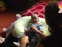 Happy baby on a cool pillow
