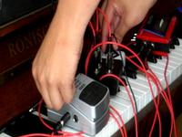 Feedback loop with drum machine, delay and tape distortion