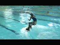 Wakeboarding in swimming pool