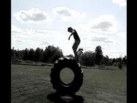 rolling down a hill in a tire