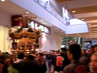 Carrying the mikoshi inside the department store