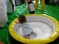 Kira Playing in a Inflatable Play Area