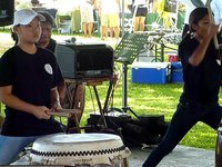 Beautiful Hawaiian girls playing drums