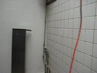 Grouting the kitchen at Slice West Village