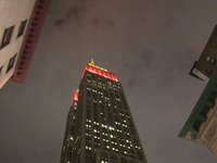 Tibet Activists Project Messages of Hope & Freedom as Empire State Bldg Glows Red for China