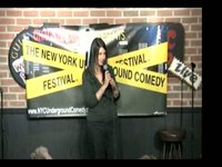 Alison Rosen performing stand up at Comic Strip Live (Wheel of Fortune phrases)