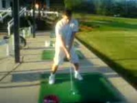 eric at the golf range