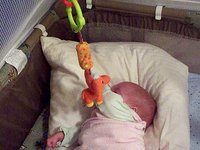 Lyra figures out her new toy