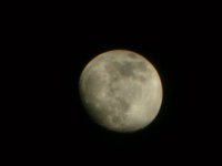 Looking at the moon using a toy telescope