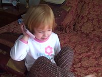 Peyton talking to Mimi on the phone