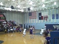 Dylan jumps over defender for a lay-up