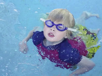 Logan Practices His Swimming Moves