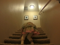 Isabella goes down the stairs
