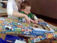 Opening presents with Enzo on his 1st Birthday