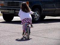 Olivia Riding Her Bike