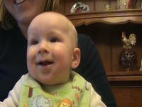 Eli giggling at Lily!