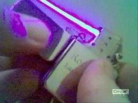 Flip top laser lighter